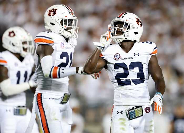 Sep 18, 2021; University Park, Pennsylvania, USA; Penn State Nittany Lions cornerback Roger McCreary (23) reacts towards the fans after intercepting the ball during the second quarter against the Auburn Tigers at Beaver Stadium. Mandatory Credit: Matthew OHaren-USA TODAY Sports